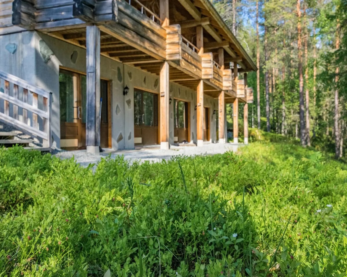 Timber accommodation building shown in the Basecamp Oulanka listing on Trivago.