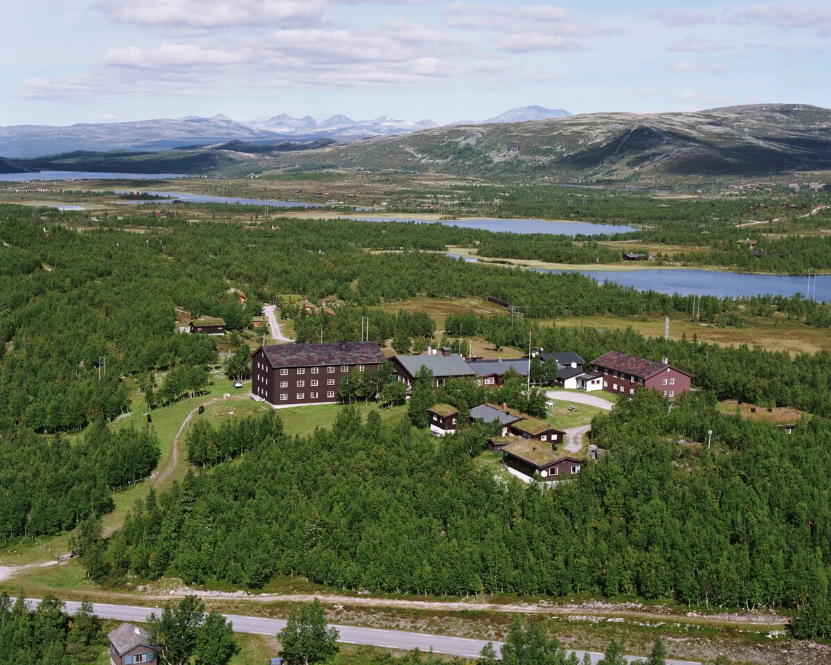 Venabu Fjellhotell surrounded by forest, lakes and mountains